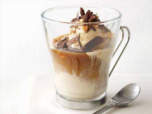 Affogato in a glass cup with spoon
