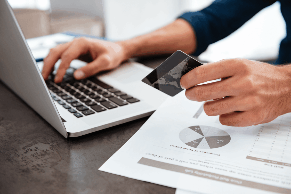 Person paying online with credit card