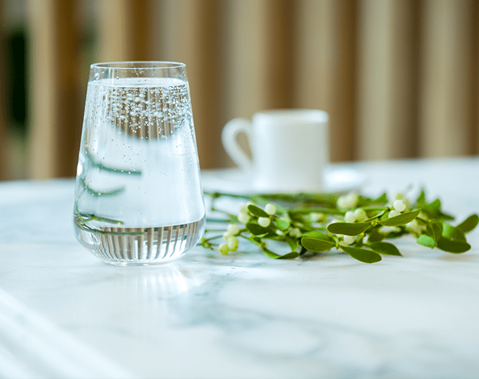 Lifestyle image of a glass of water