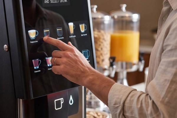 Vitro S2 Instant Machine - hand selecting drink