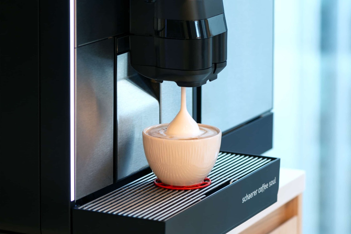 Coffee cup filling on operated vending machine