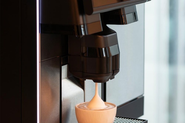 Schaerer Soul 12 -cup on machine being filled with coffee