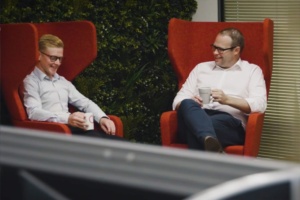 Two Liquidline staff meeting with coffee