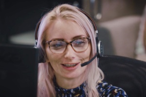 Liquidline customer support worker on headset