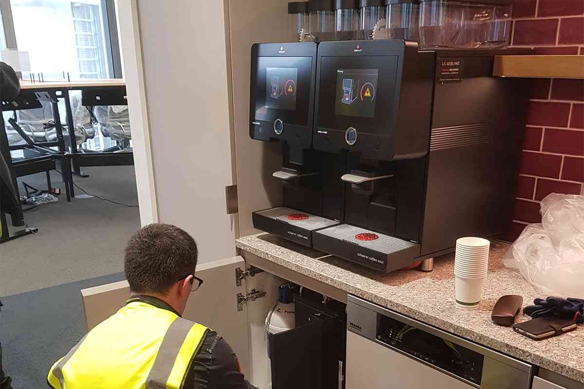 inside 22 bishopsgate kitchen area with liquidline machine being installed