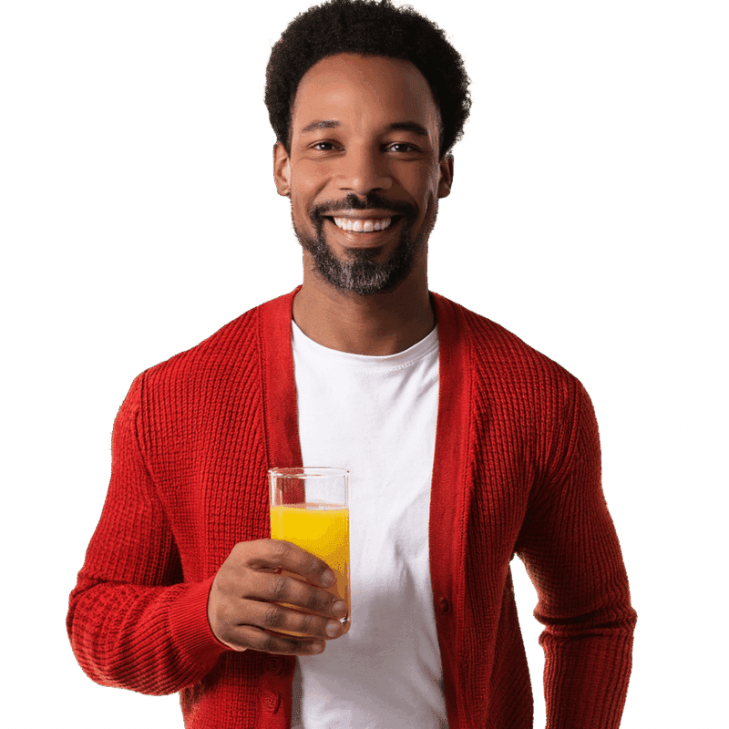 Man holding a glass of fresh juice