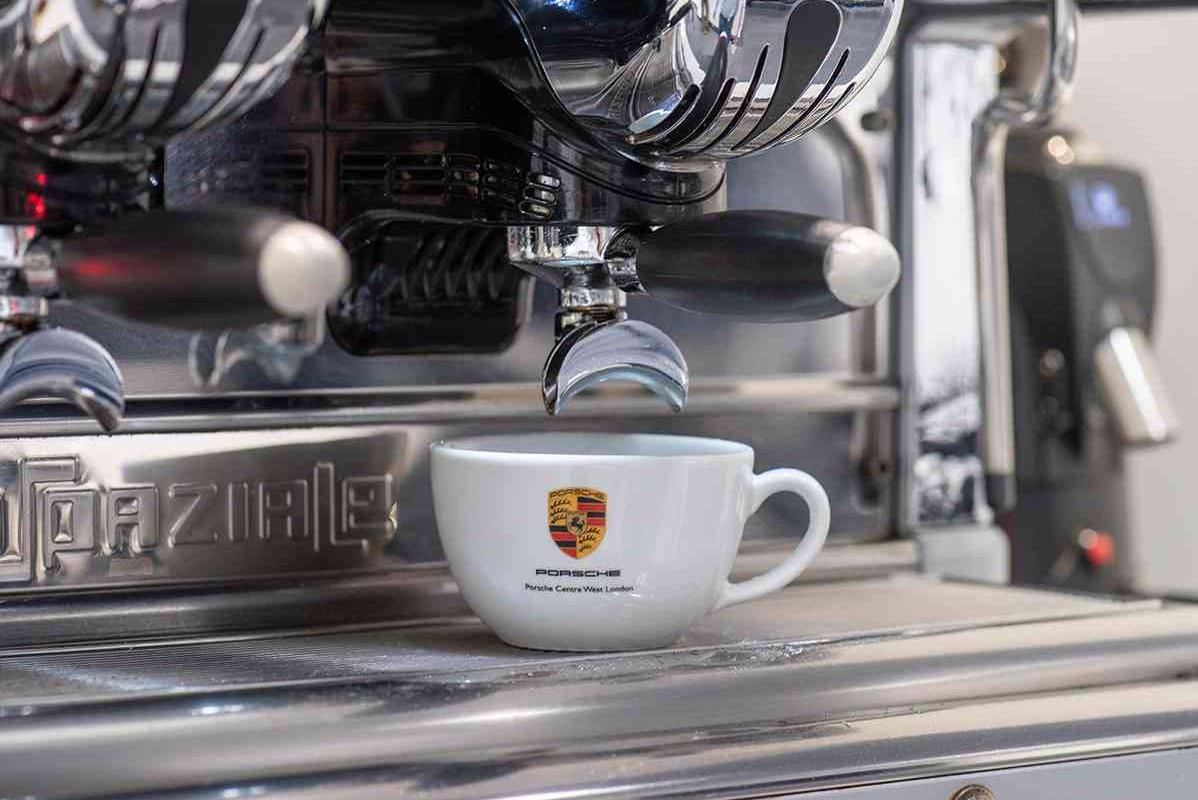 porsche coffee cup on espresso machine