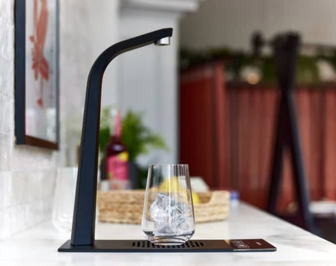 Borg & Overstrom T3 water dispenser with a glass of ice