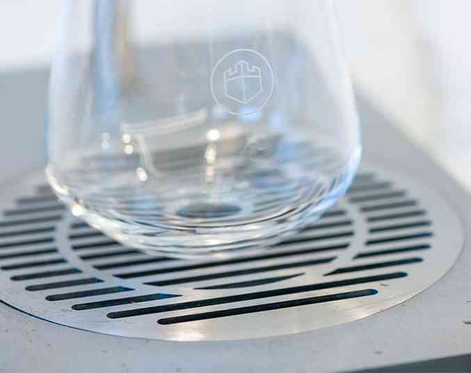 Borg & Overström T2 with a glass over the drip tray