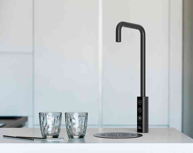 Borg & Overström T1 with two glasses next to it