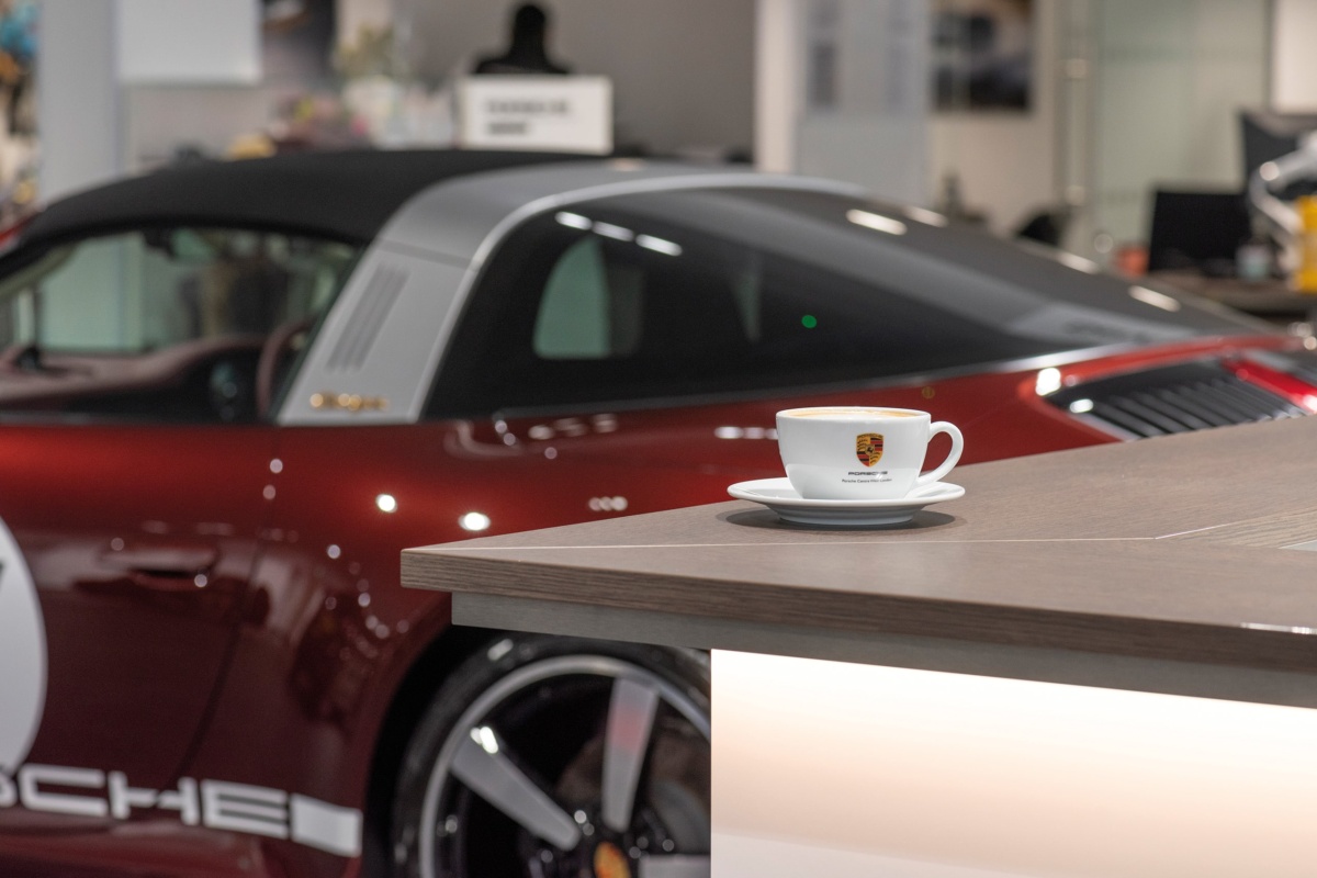 Liquidline coffee cup in automotive showroom
