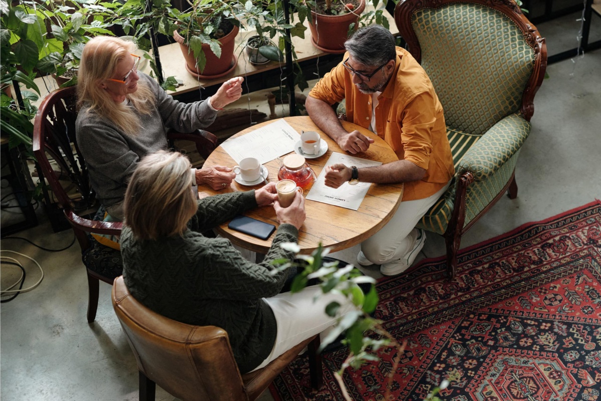 People in garden centre enjoying coffee