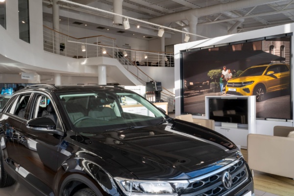 car showroom with coffee machine in table