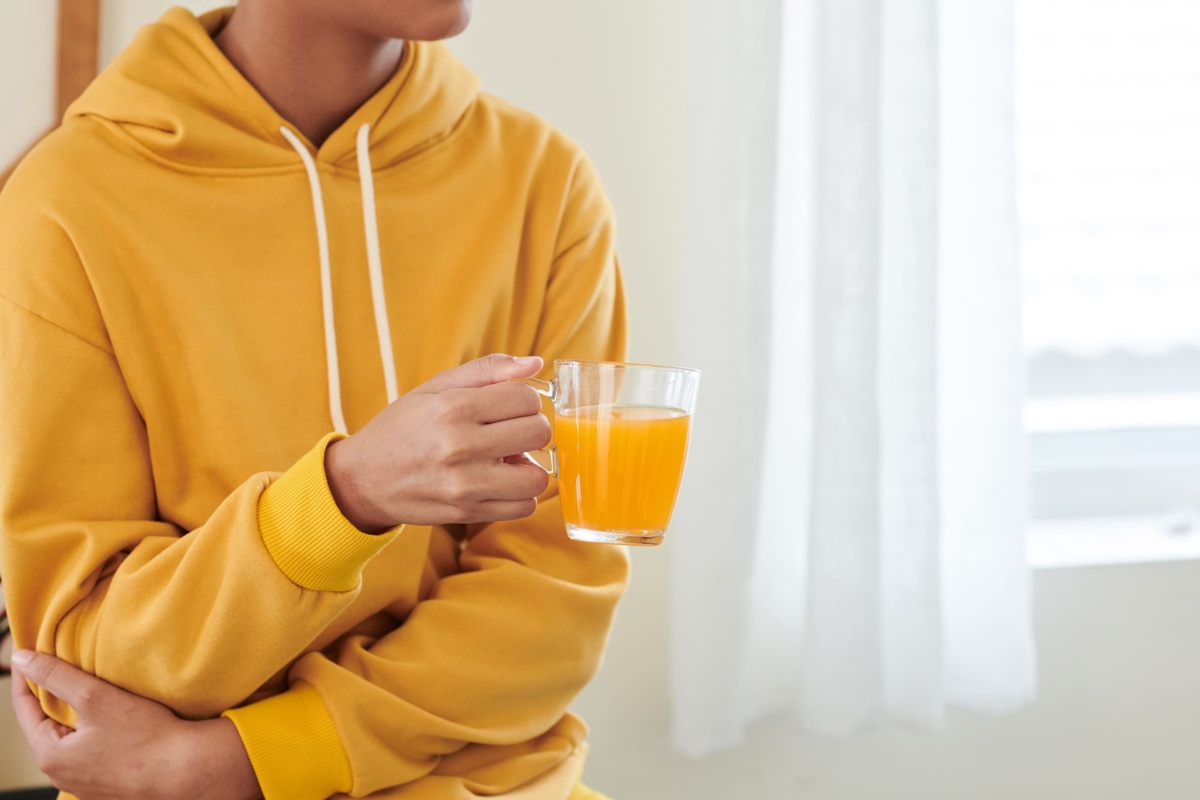 Student with glass of juice
