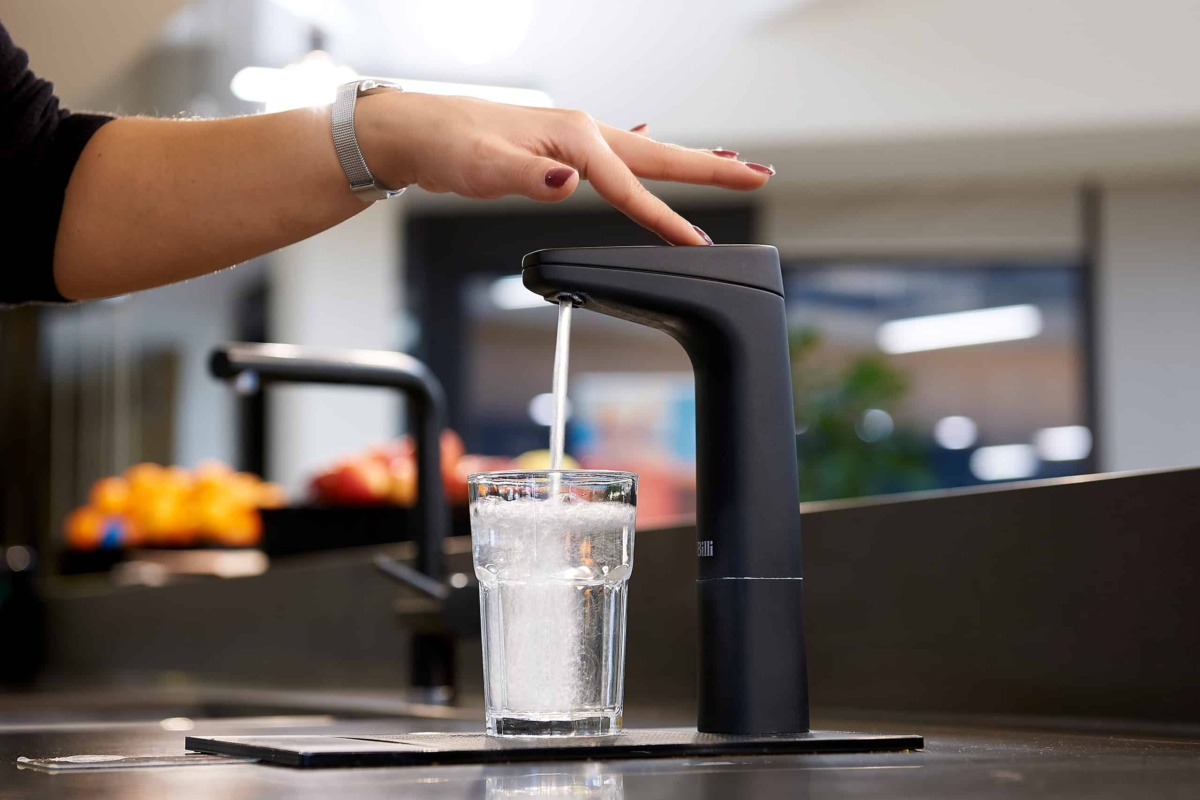 Liquidline water dispenser tap being used
