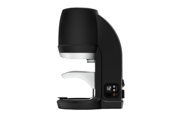 Black PuqPress automatic coffee tamper shown from the side, featuring a compact cylindrical top and a metal tamping mechanism at the base.
