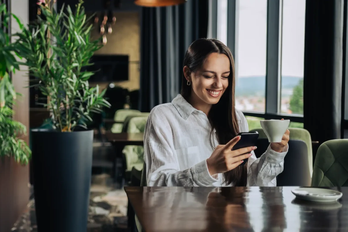 woman enjoying a coffee in the hotel lounge