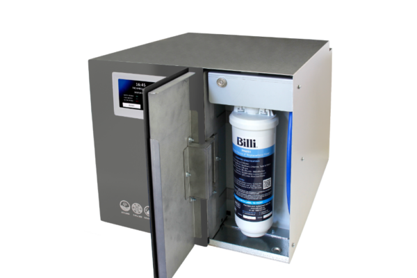 Billi OmniOne underbench water system with the front door open, showing the internal filtration cartridge and illuminated interior.