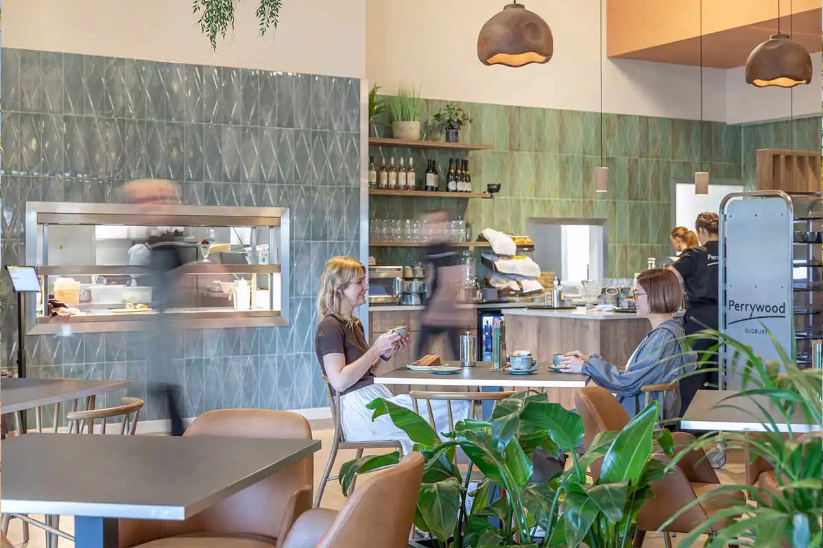 Two women sat in Perrywood Garden Centre café