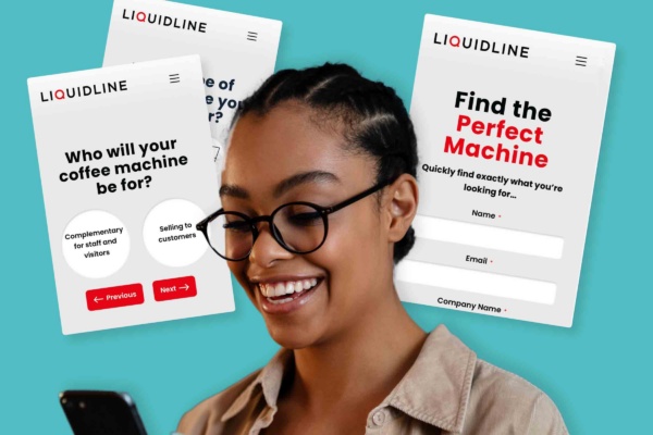 woman looking at phone to help her decide on a coffee machine