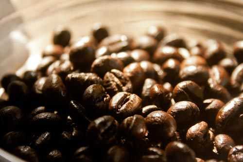 roasted coffee beans in a jar