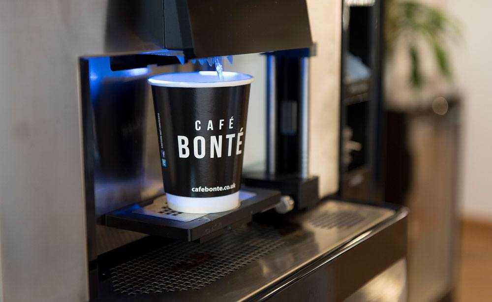 commercial coffee dispenser in use