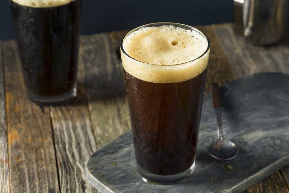 Nitro cold brew in a pint glass