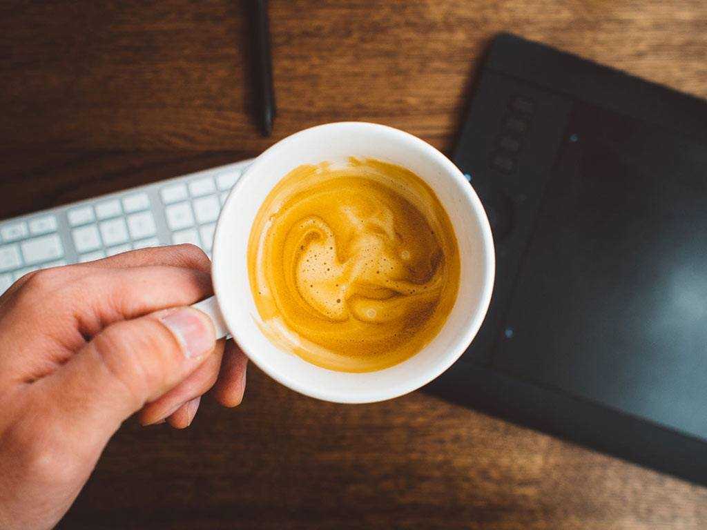 person holding an espresso