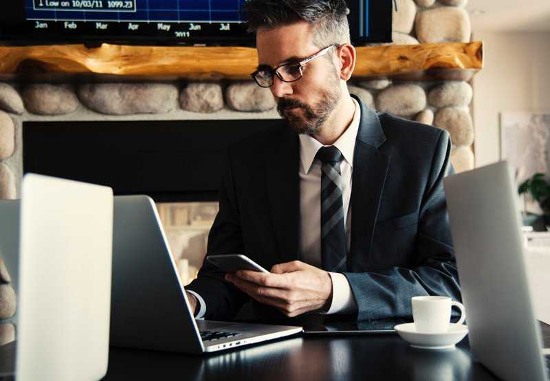 man in suit working hard