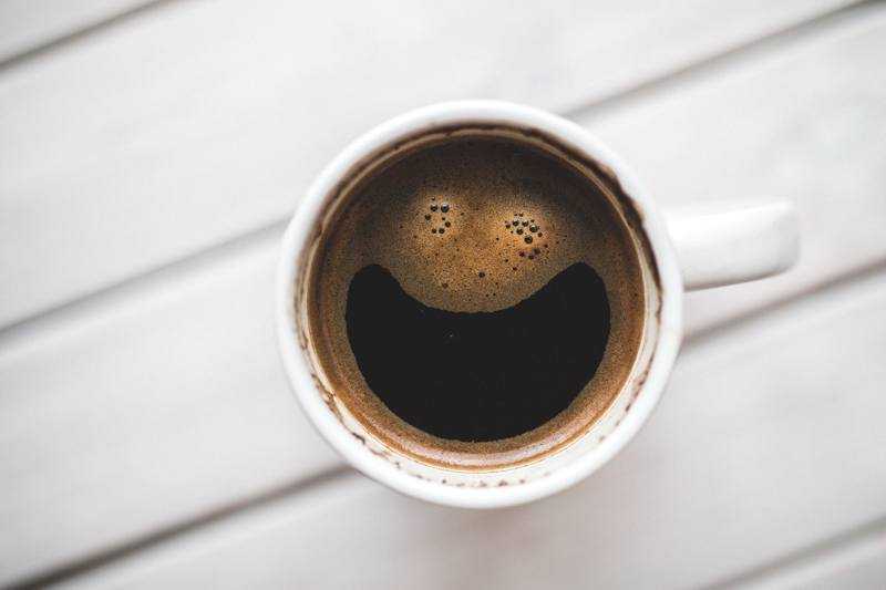 coffee with smile made out of crema