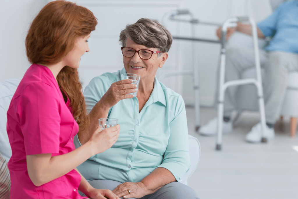 Carer and patient drinking water