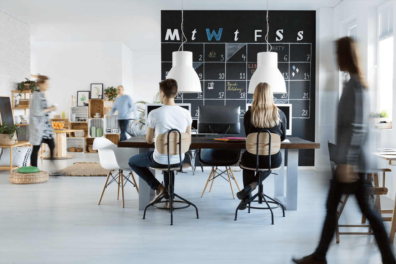 People working in a trendy office