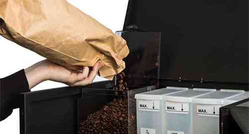 Pouring Coffee Beans into Automatic Coffee Machine