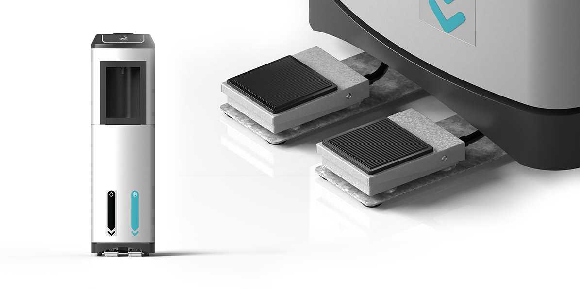 Two foot pedals attached to the bottom of a Kalix water cooler to the left hand side is a small image of a full size silver Kalix Water Cooler