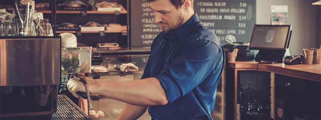 Barista Making Coffee in Coffee Shop