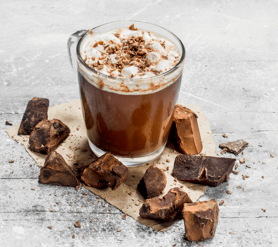 Honeycomb hot chocolate next to chocolate chunks