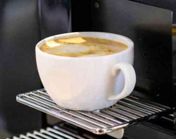 Coffee cup on machine