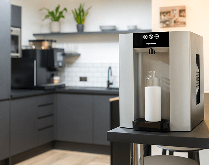 Extra large drink dispenser on a Borg and Overstrom E4 water cooler in kitchen