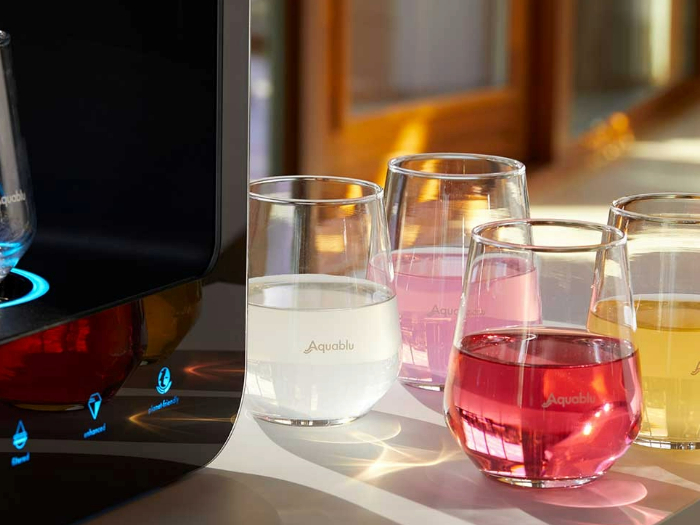 Aquablu cups with flavoured water inside